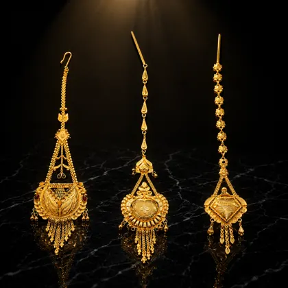 Gold Maang Tikka Collection available through Gayatri Jewellers