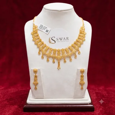 Gold Necklace and Earring Set available through Shivani Jewellers