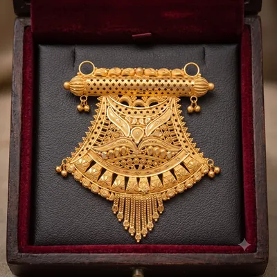 Gold Mala Locket available through Shivani Jewellers